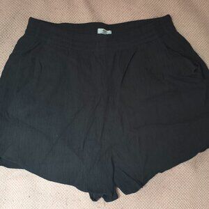 Black pleated flowy shorts